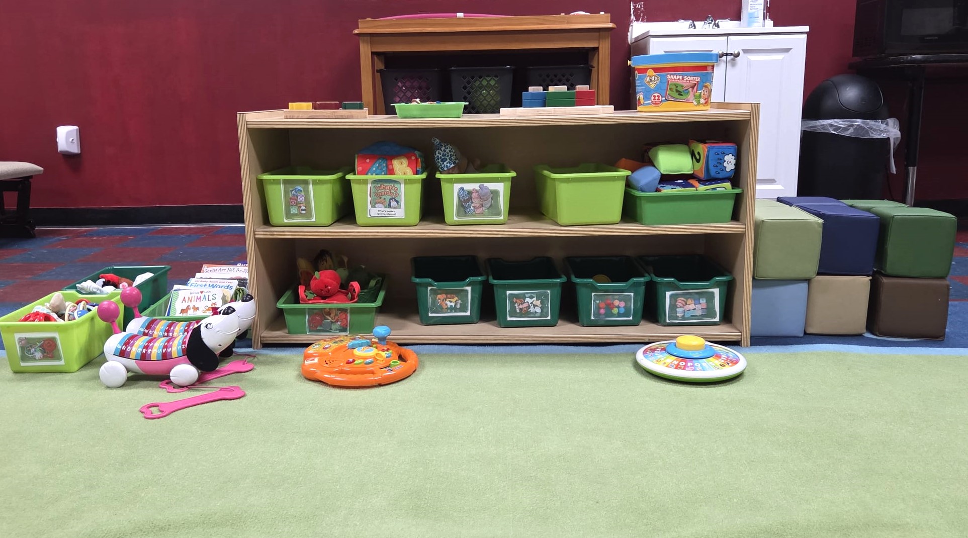 Children enjoying hands-on activities at Houston daycare Kindercity Champions.