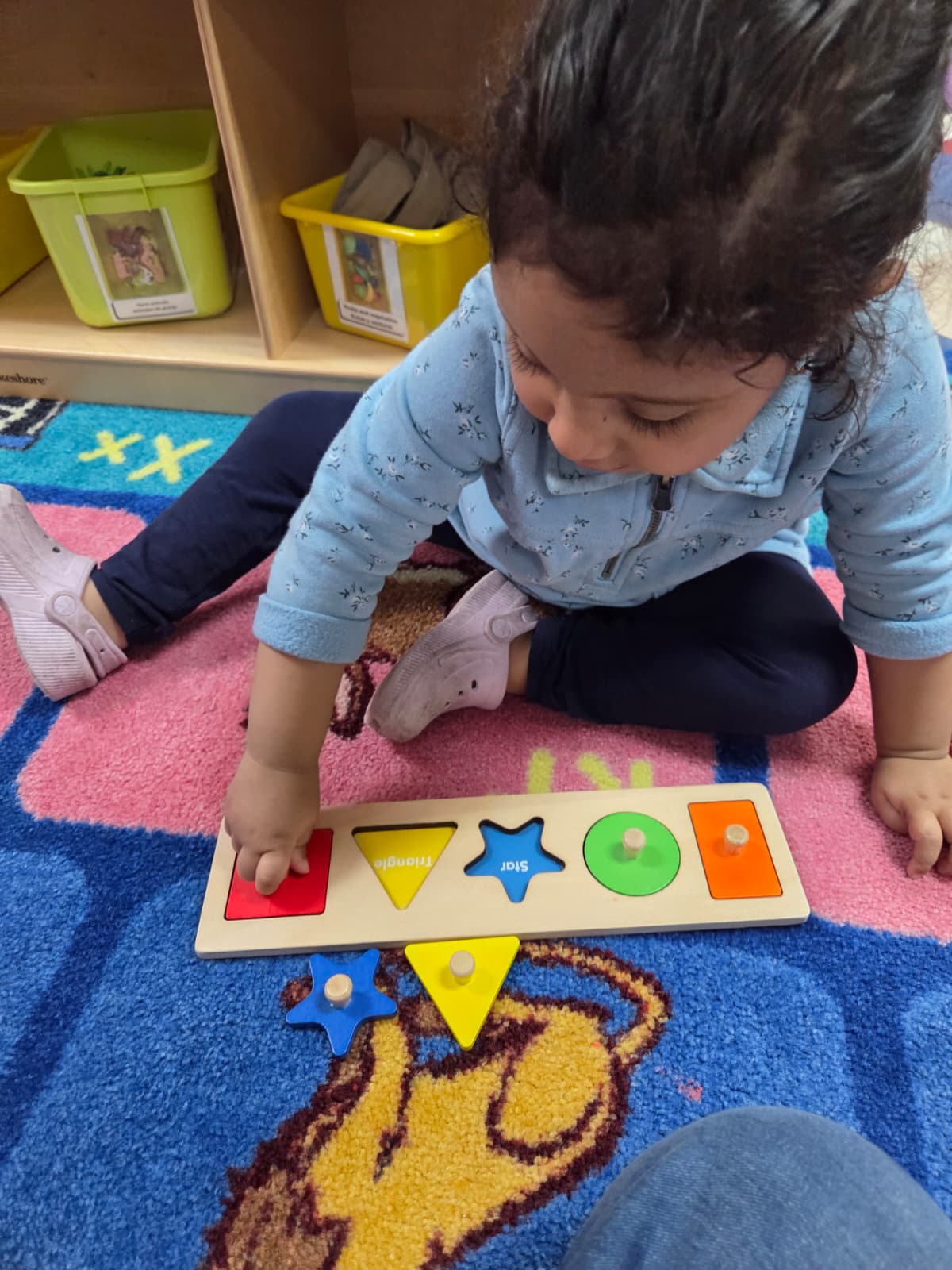 Toddlers learning together at Kindercity Champions child care Houston.