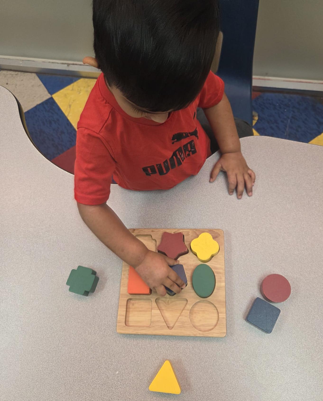 Toddler classroom moments at Kindercity Champions childcare center.